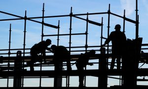 Construction workers do their job on the site of the European Central Bank's (ECB) new headquarters in Frankfurt am Main, central Germany on October 31, 2013. The building is expected to be completed by the middle of 2014. AFP PHOTO / DPA / DANIEL REINHARDT +++ GERMANY OUT +++